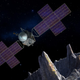 An illustration of the Psyche spacecraft orbiting Psyche.